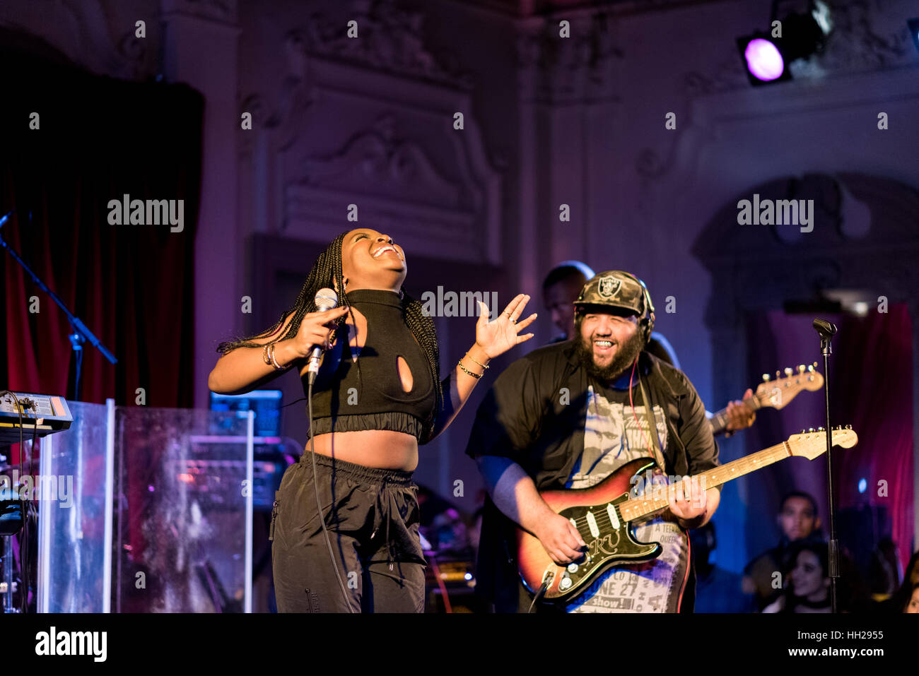 Ray BLK, singer, interacting with her guitarist at a live concert in September 2016. Stock Photo