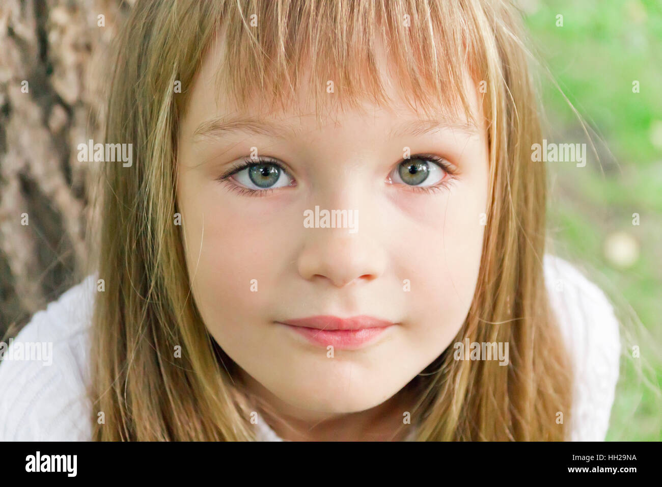 Photo of cute girl with long hair Stock Photo - Alamy