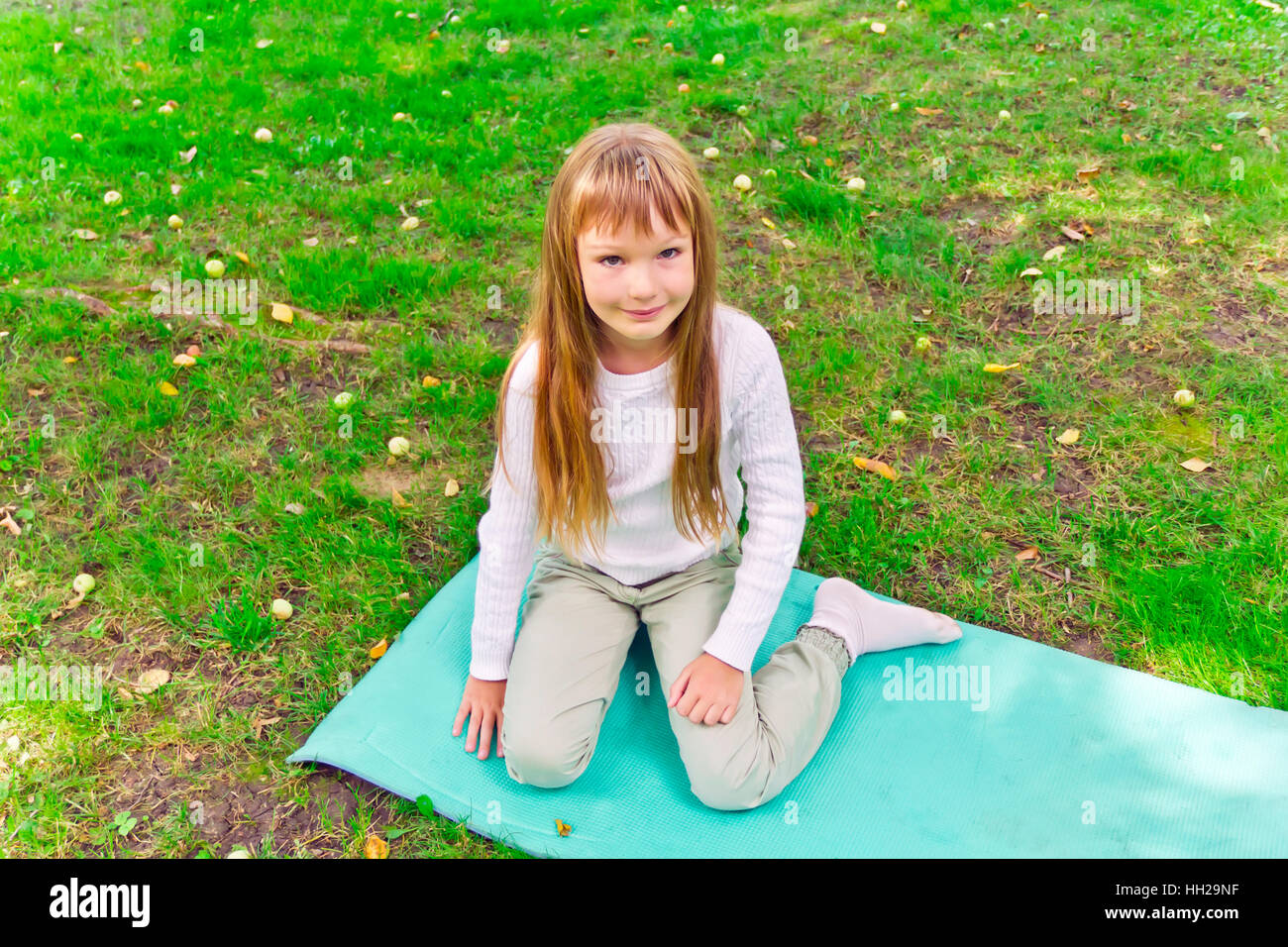 Photo of cute playing girl in summer Stock Photo - Alamy