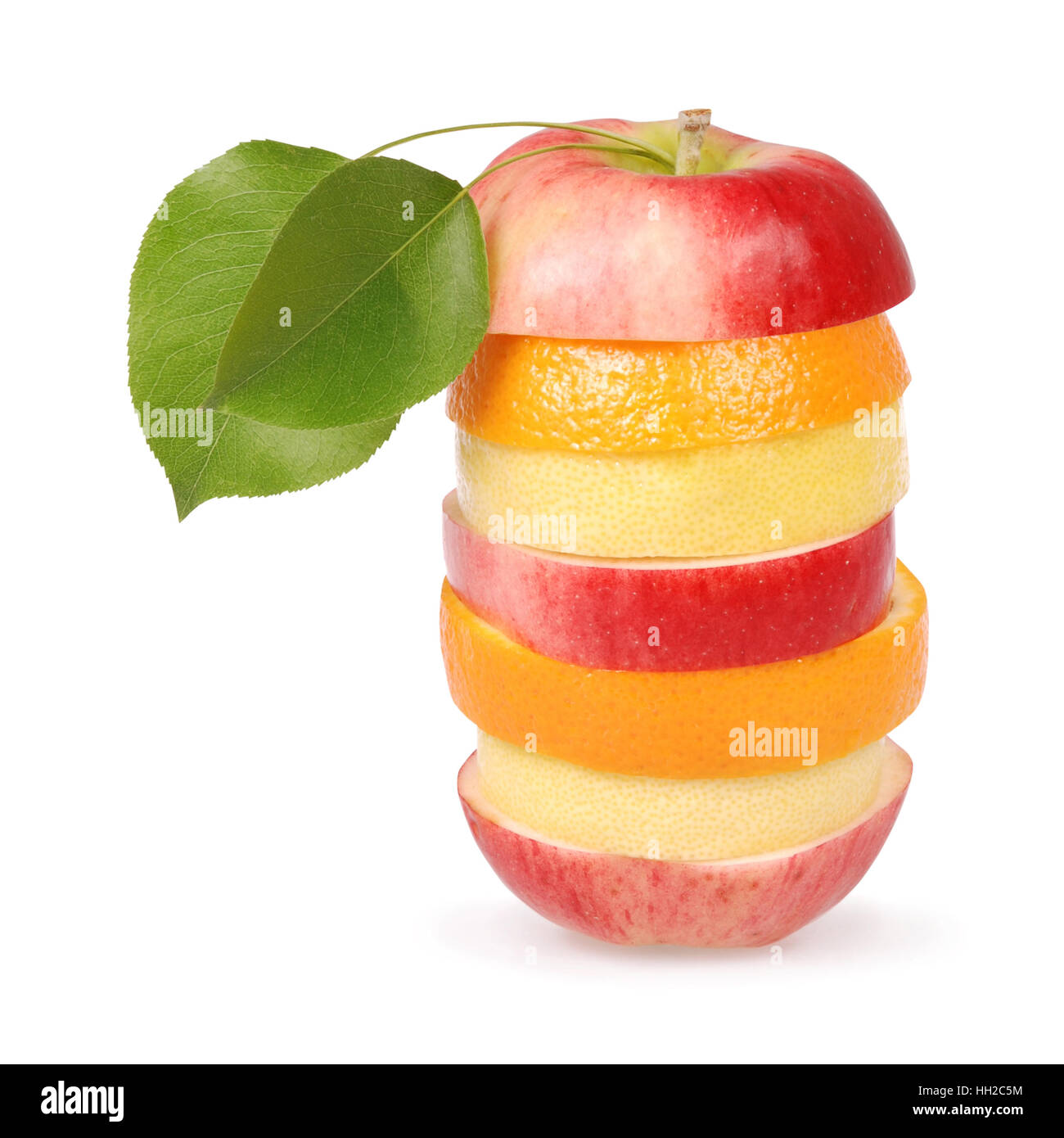 Cheerful mixed fruits with leaves including orange, pear, apple and lemon isolated on white. Clipping path included. Stock Photo