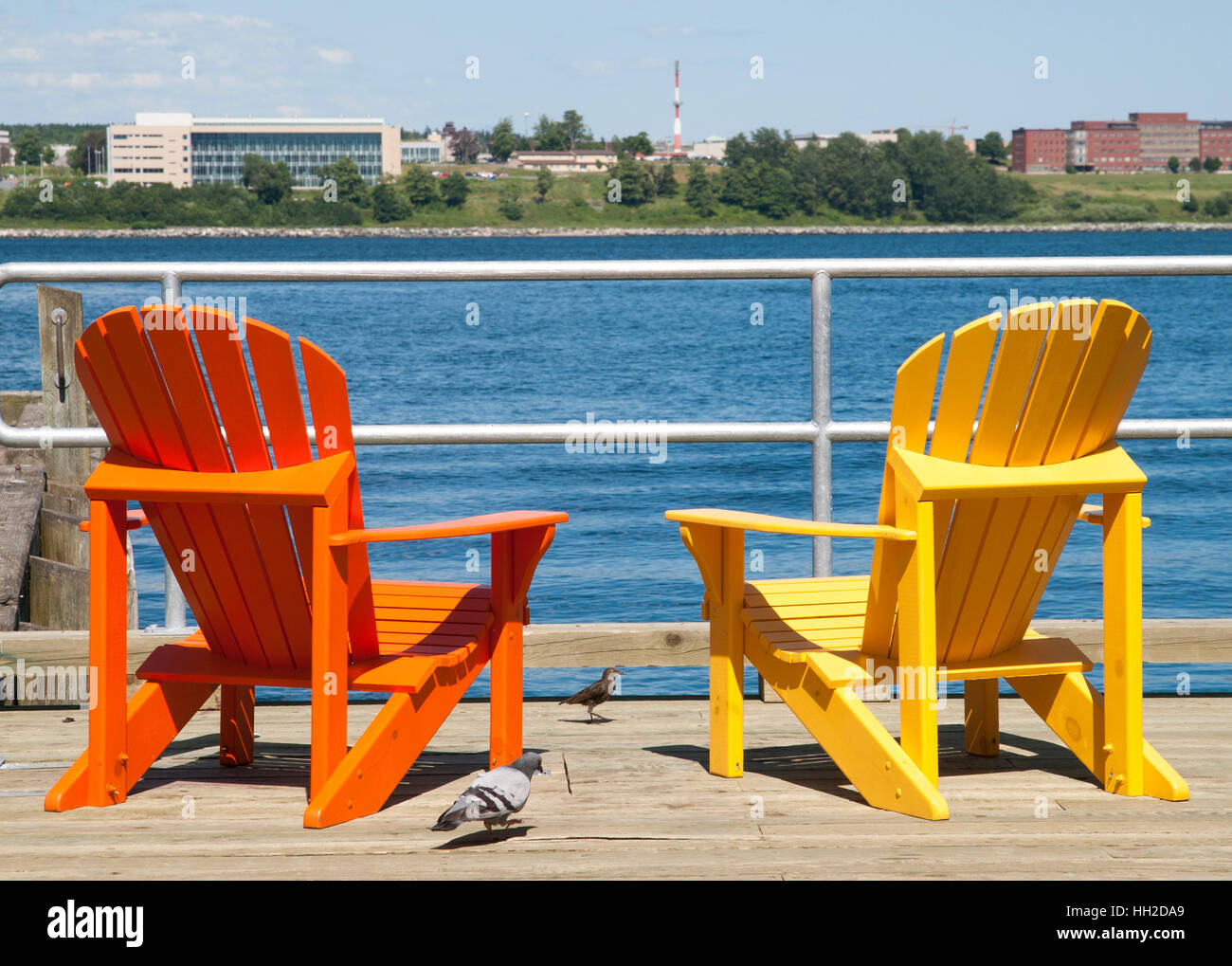 Two colorful chairs on Halifax city promenade (Nova Scotia, Canada). Stock Photo