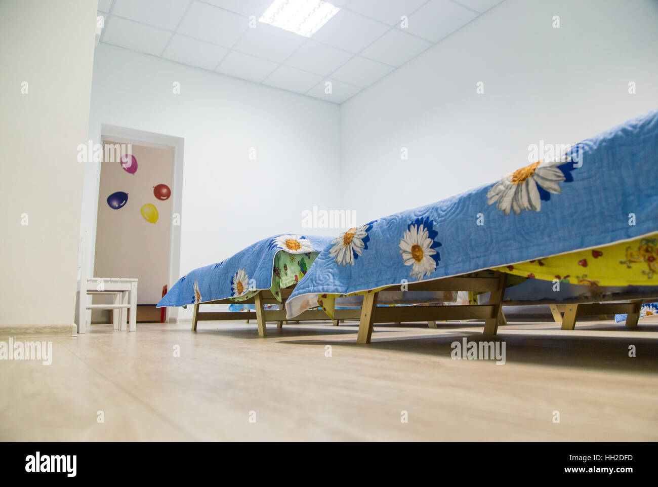 Kindergarten bedroom with blue beds Stock Photo Alamy