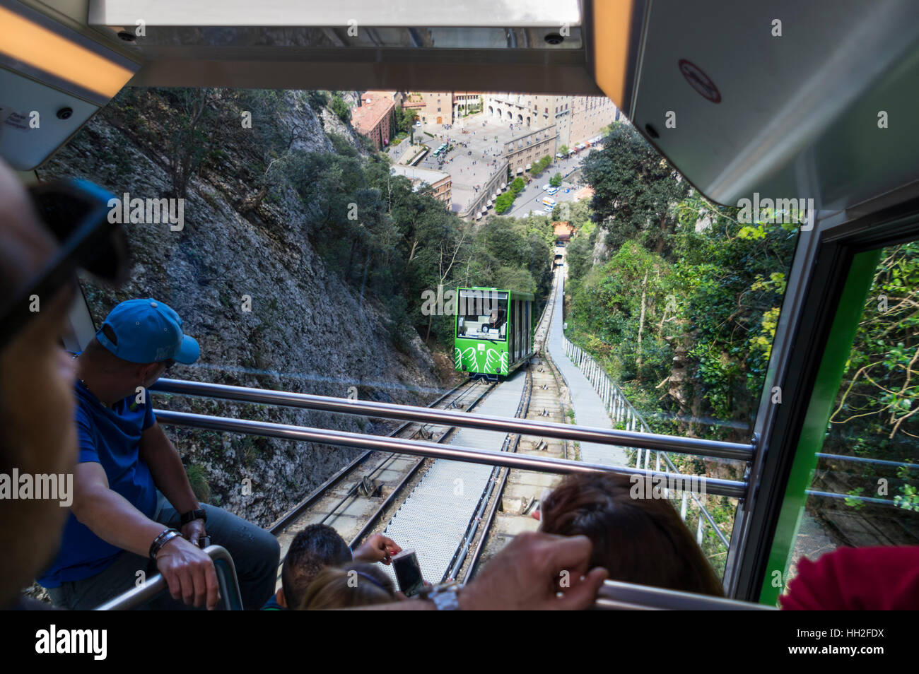 Ride in the funicular de Sant Joan in Montserrat, Catalonia, Spain. Looking down to the passing track with the second wagon. Stock Photo