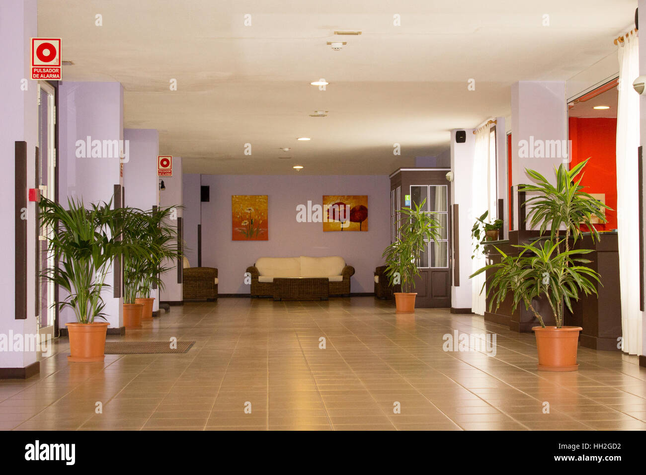 The front entrance and waiting area of Apartmentos Centro Cancajos. A hotel apartment in Las Palma, Canary Islands, Spain. Stock Photo