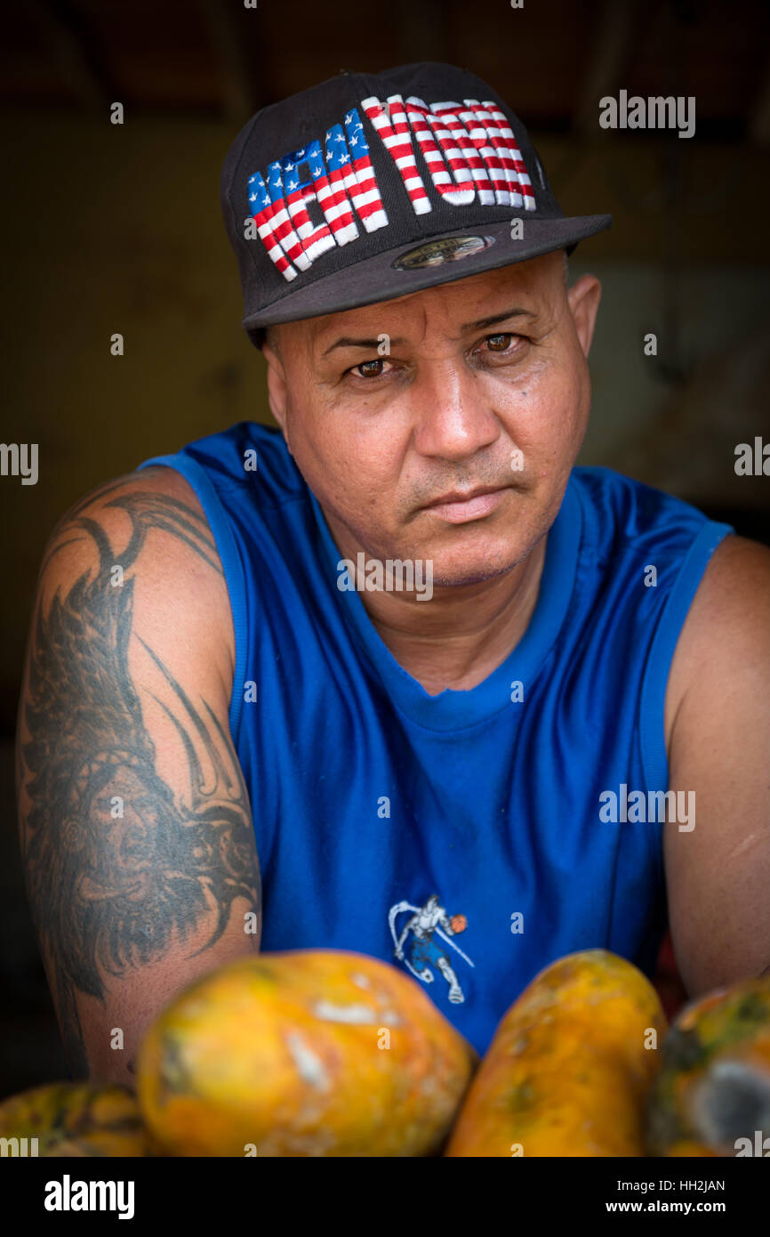 Portrait of a man in Trinidad, Cuba, wearing a New York cap Stock Photo