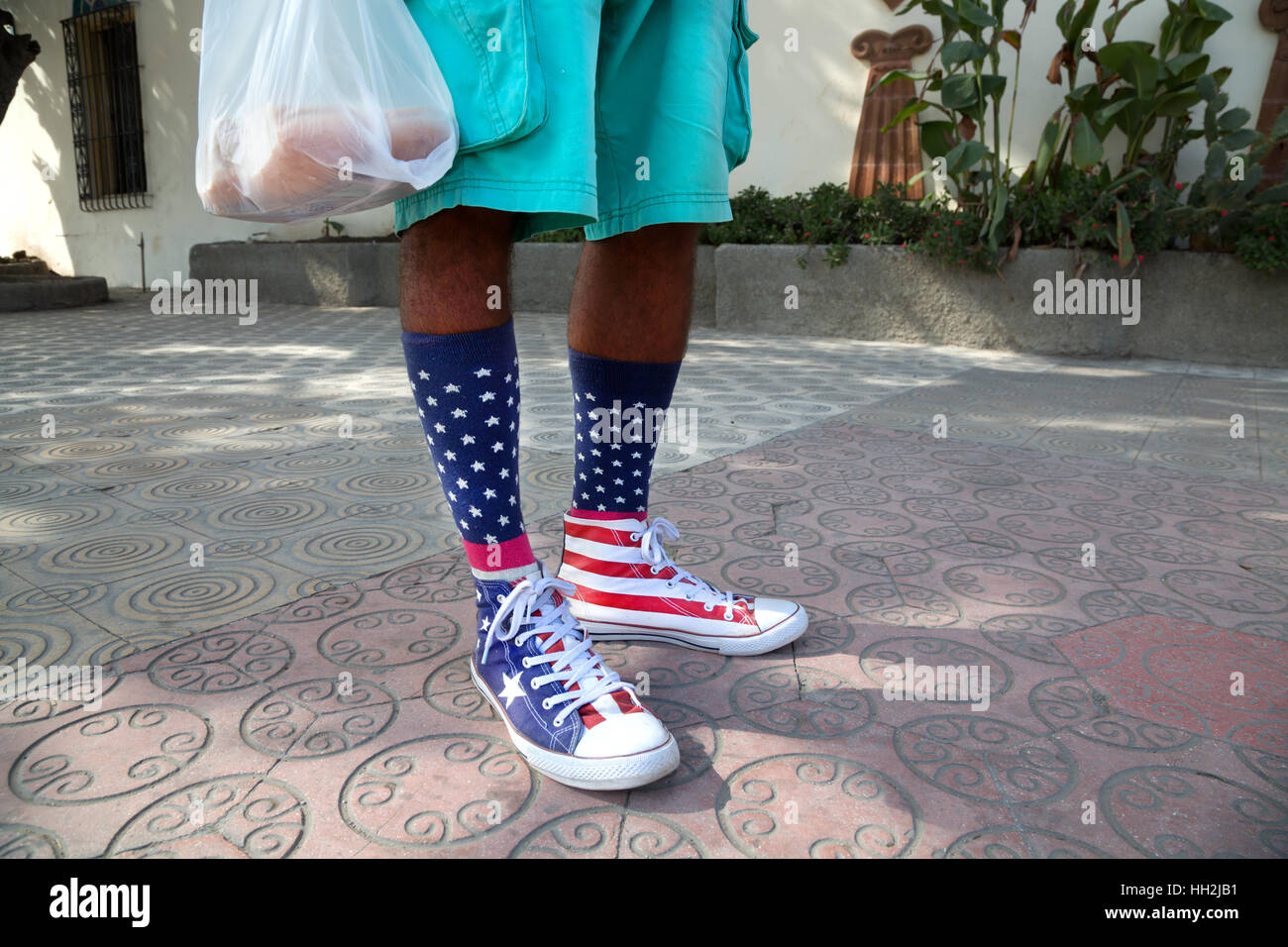 Man wearing socks with American USA US flag, in Santa Clara, Cuba Stock  Photo - Alamy