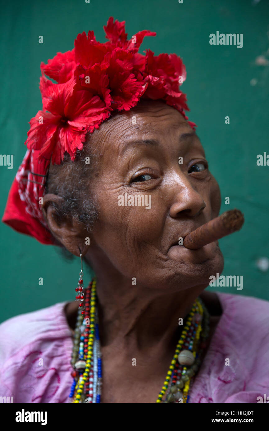 Woman smoking cohiba cigar in Havana, Cuba Stock Photo