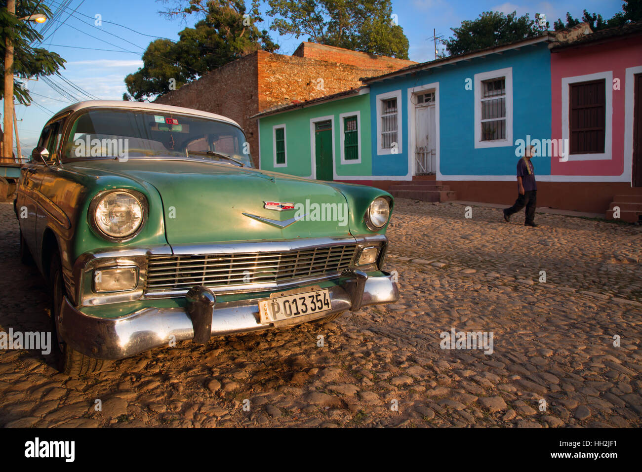 Classic old american car in the streets of Trinidad, Cuba, by sunrise Stock Photo