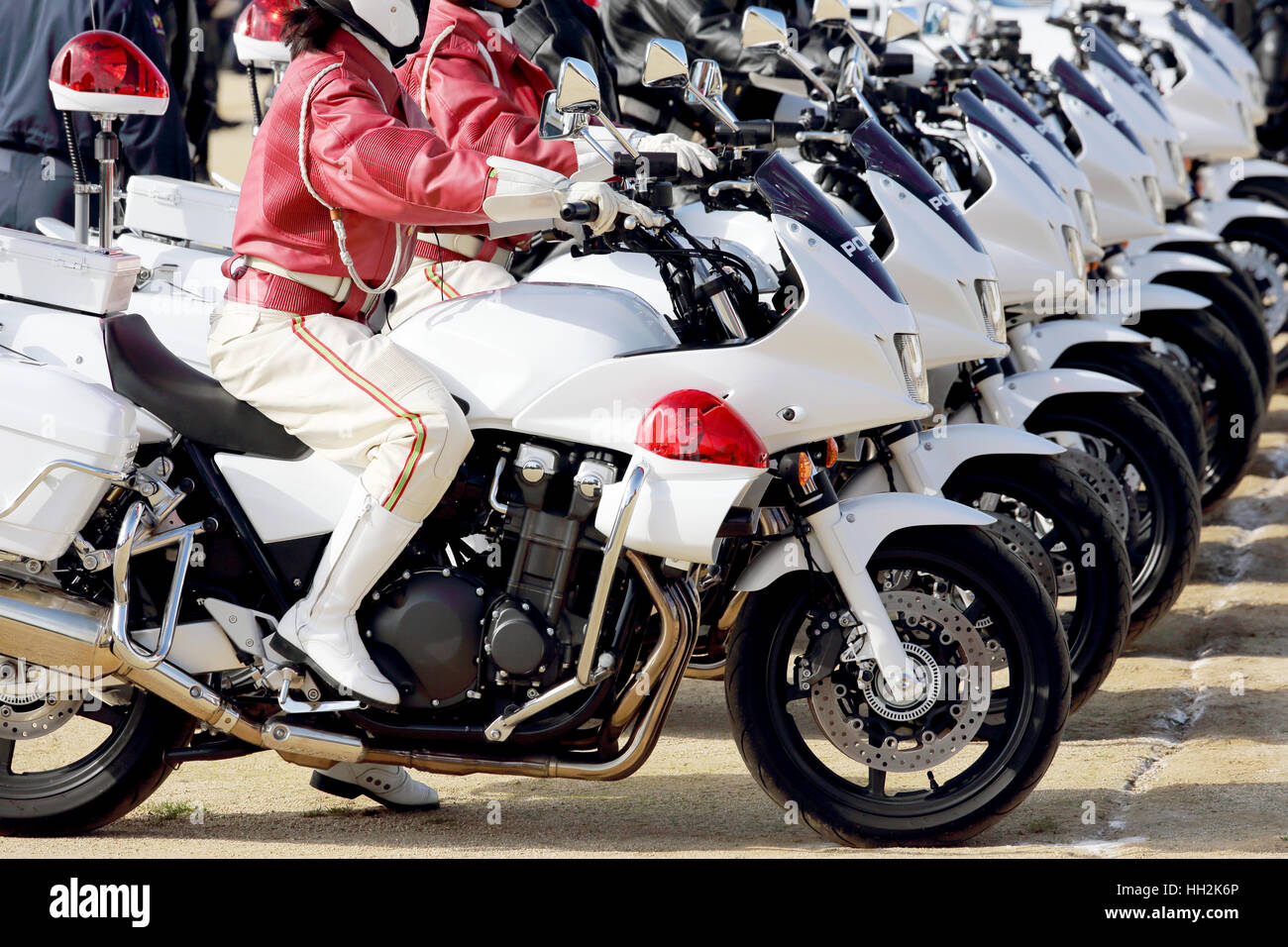 Row of Japanese police woman on motorcycle Stock Photo - Alamy