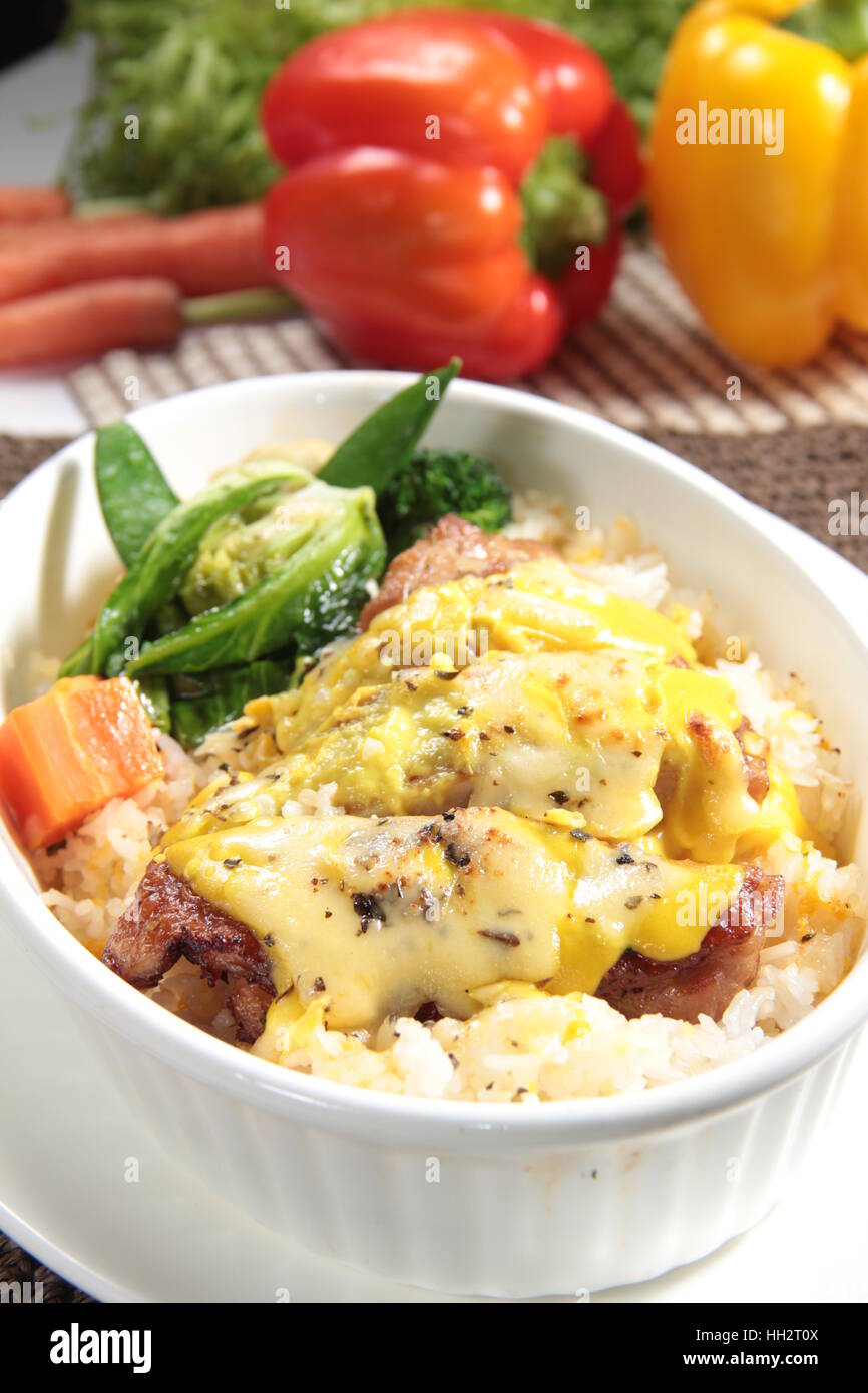 a photo of baked rice Stock Photo - Alamy