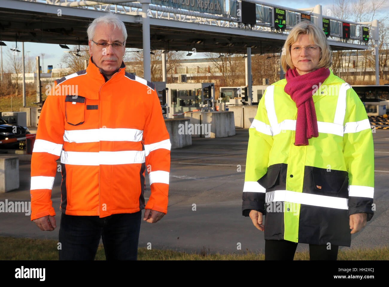 Rostock, Germany. 5th Jan, 2017. Yvonne Osterkamp (r) and Olaf Wiechmann, CEOs of the Warnowquerung GmbH & Co. KG, stand in front of the road charge station at the Warnow tunnel in Rostock, Germany, 5 January 2017. The 220-million-Euro tunnel opened in 2003 as Germany's first privately financed infrastructure project. Photo: Bernd Wüstneck/dpa-Zentralbild/dpa/Alamy Live News Stock Photo