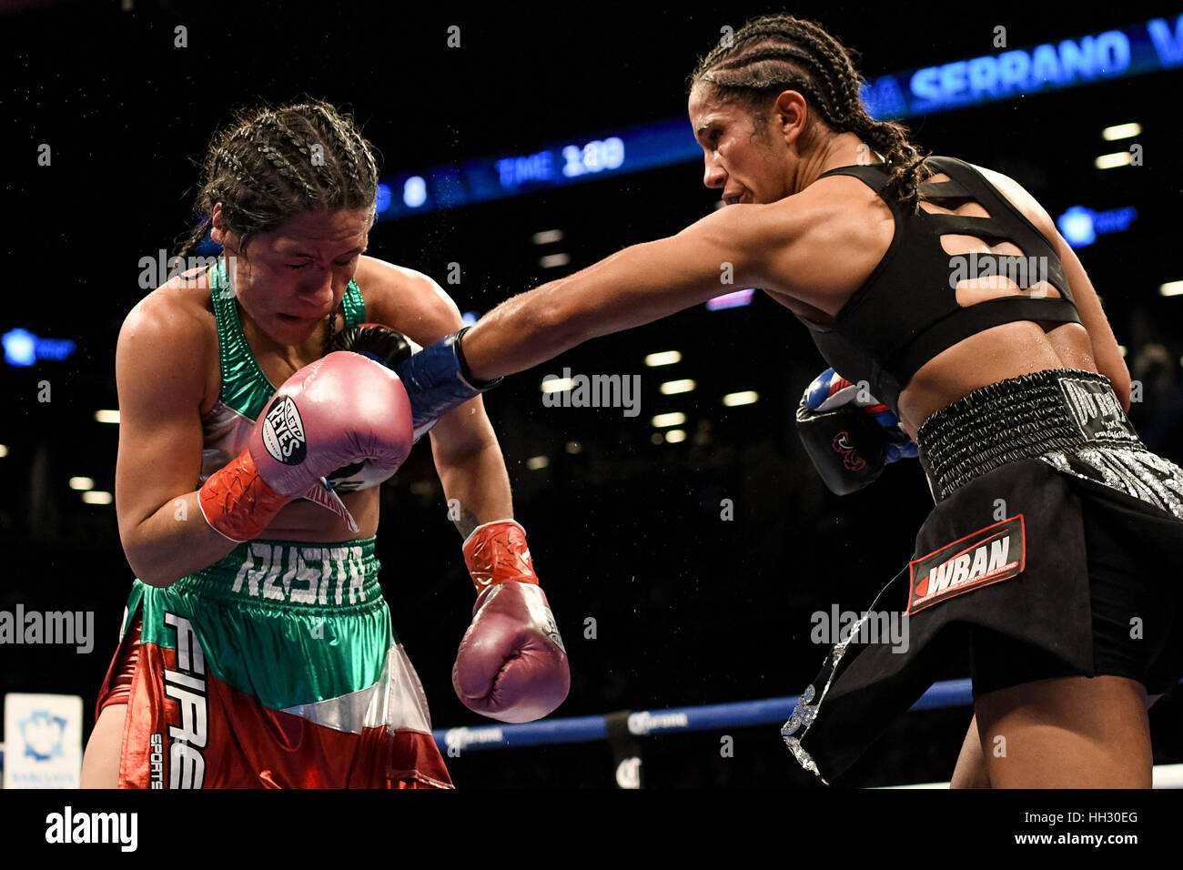 Brooklyn, USA. 14th Jan, 2017. Amanda Serrano (black and silver trunks) and Yazmin Rivas battle Brooklyn, USA. 14th Jan, 2017. Amanda Serrano (black and silver trunks) and Yazmin Rivas battle