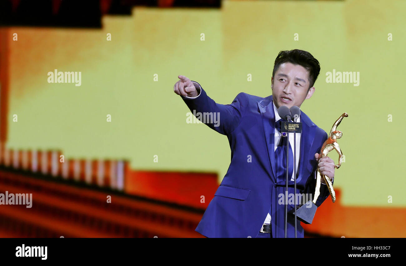 Beijing, China. 15th Jan, 2017. China's boxer Zou Shiming is awarded the Best Non-Olympic Athlete of the Year during the ceremony of 2016 CCTV Sports Personality of the Year in Beijing, capital of China, Jan. 15, 2017. Credit: Ding Xu/Xinhua/Alamy Live News Stock Photo