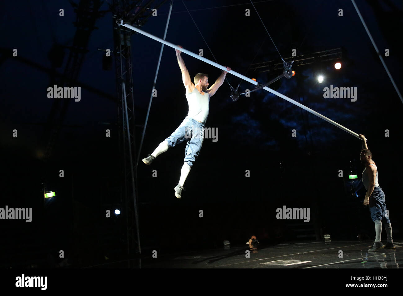 Sydney, Australia. 17 January 2017. London-based aerial theatre company, Ockham’s Razor, push themselves to the limit on 5 metre-long metal poles that transform into a myriad of walkways, pillars and pendulums in a blend of circus, acrobatics, playground games and trust exercises. Set in the round with the audience drawn in close to the action, the five performers are enclosed within the circle of the stage. Tipping Point is showing at the Spaghetti Big Top, Prince Alfred Square, Parramatta for the Sydney Festival. Credit: © Richard Milnes/Alamy Live News Stock Photo