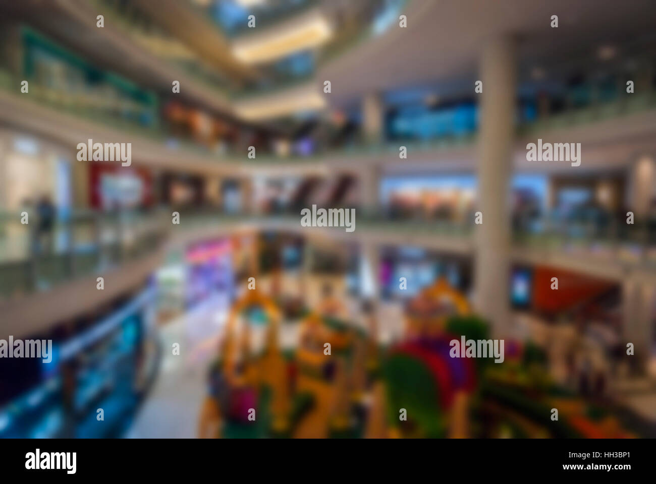 Blurred image of shopping mall interior Stock Photo - Alamy
