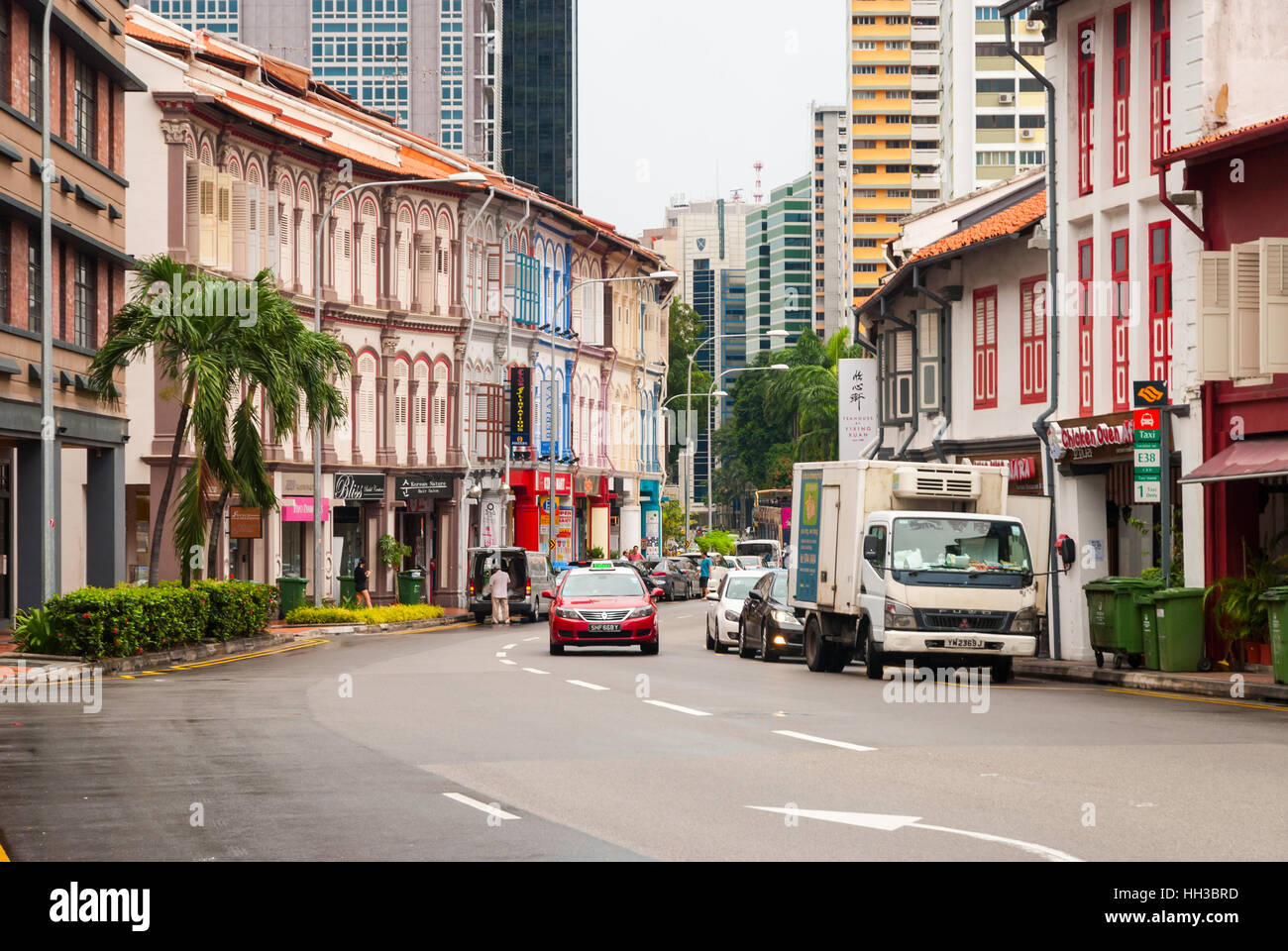SINGAPORE - APRIL 3: View on Singapore city road with transport and old buildings, april 2016 Stock Photo