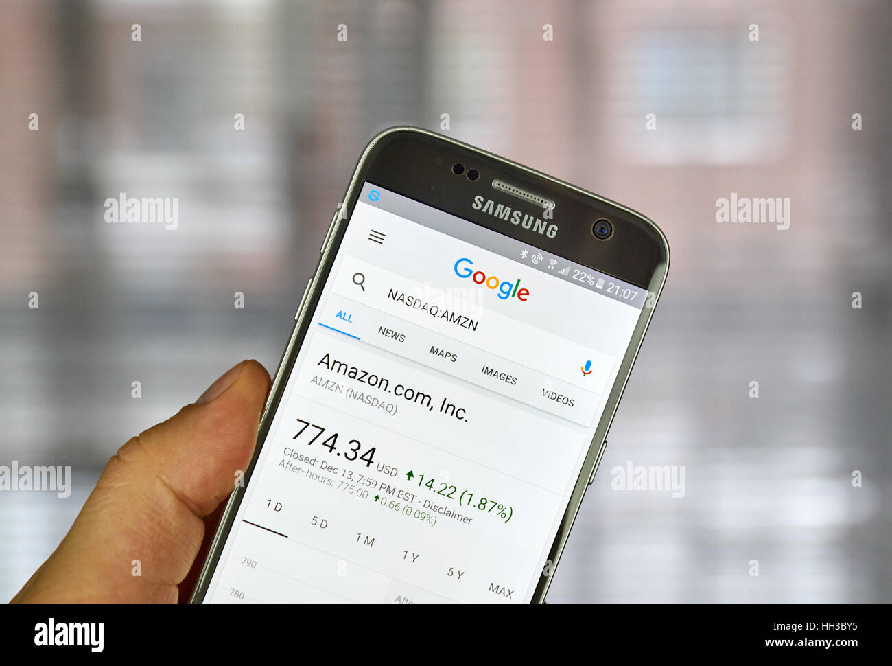 MONTREAL, CANADA - DECEMBER 23, 2016 : Google Finance page with stock chart and Amazon ticker on Samsung S7 screen. Stock Photo