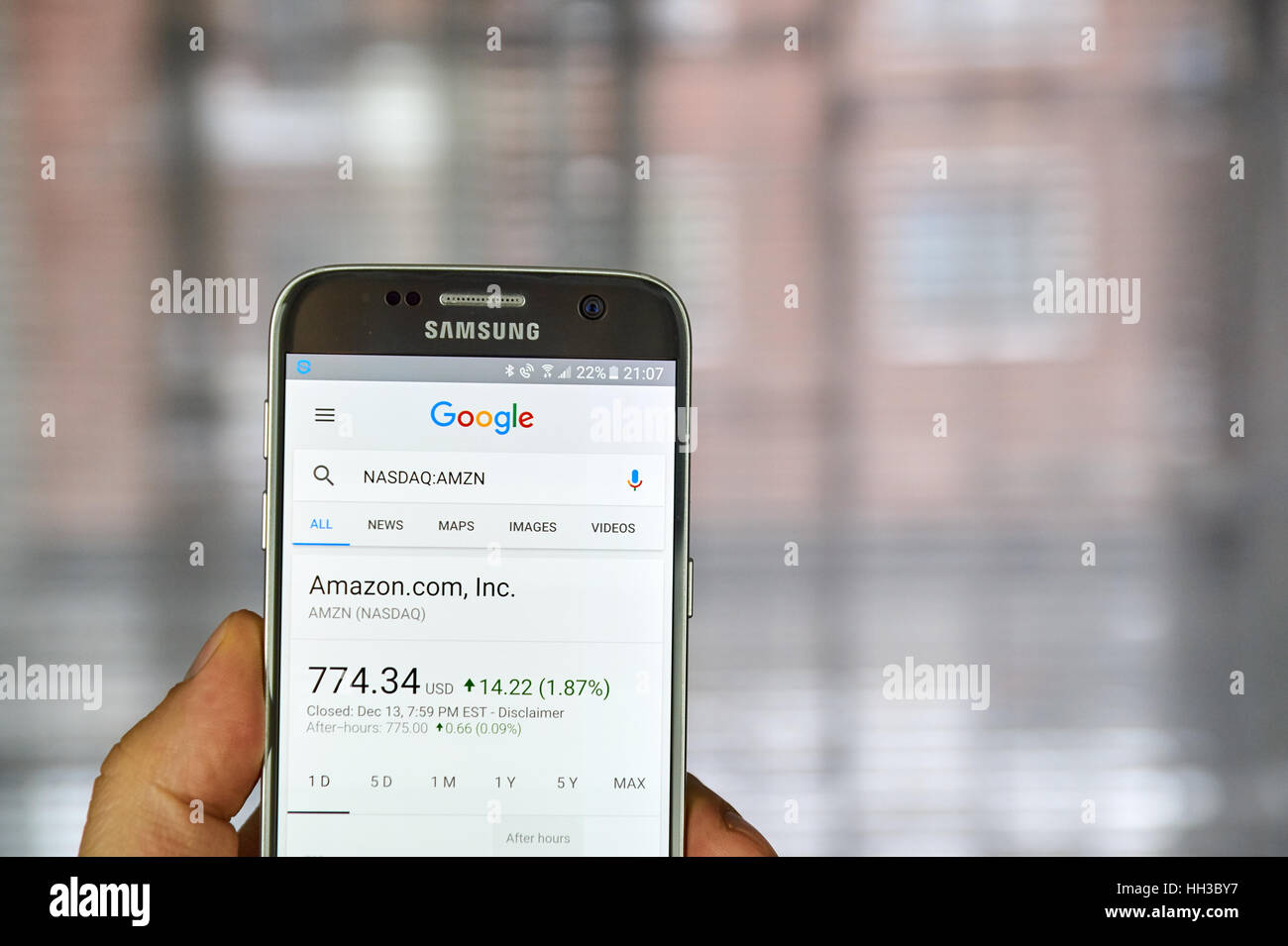 MONTREAL, CANADA - DECEMBER 23, 2016 : Google Finance page with stock chart and Amazon ticker on Samsung S7 screen. Stock Photo