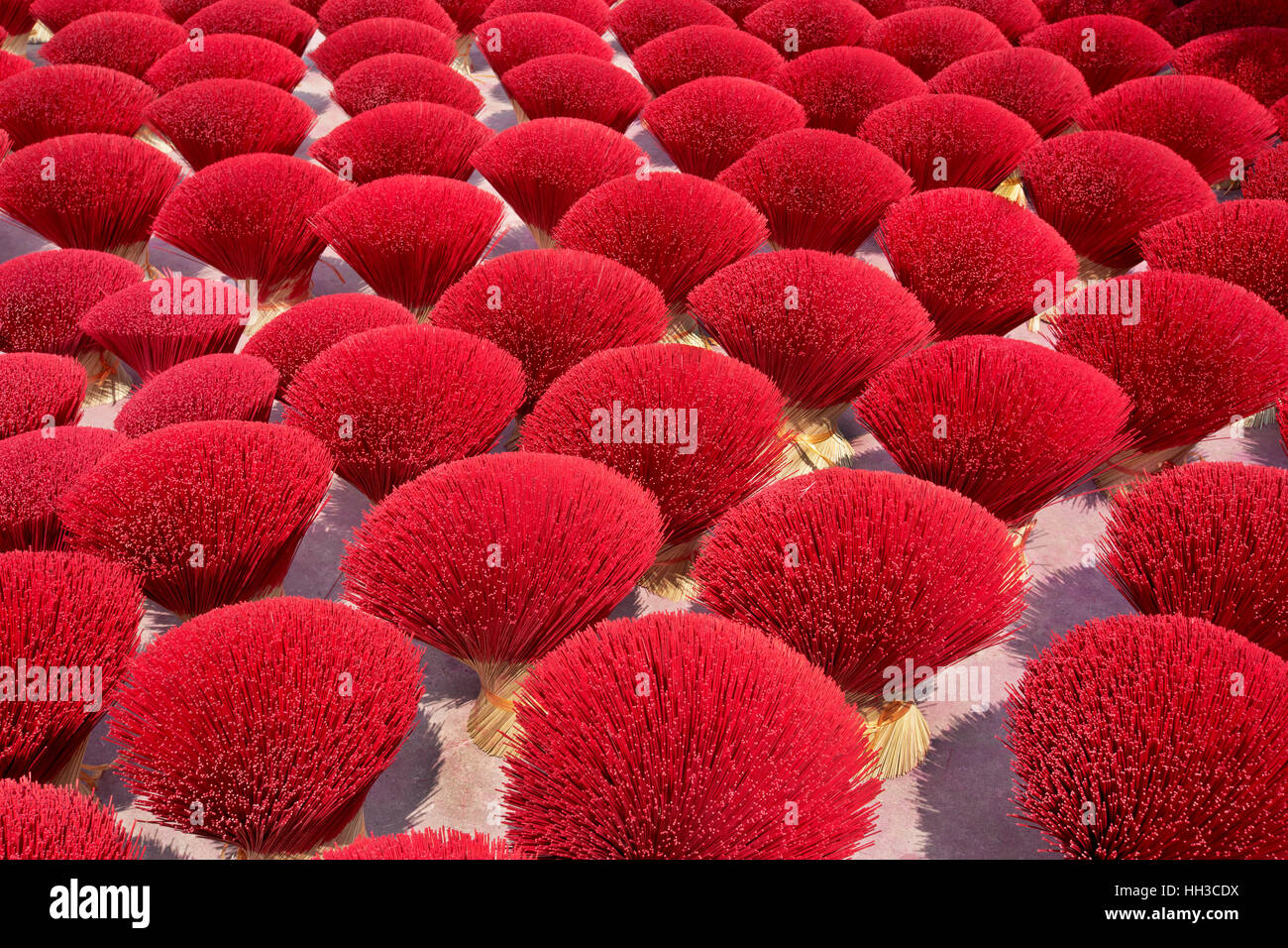 Colorful drying incense sticks,  awaiting application. Stock Photo