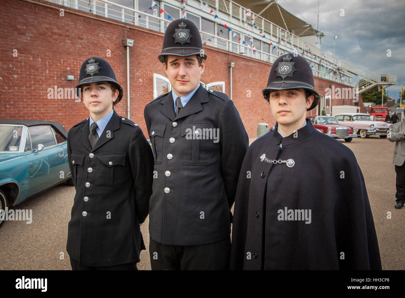 three vintage policeman on parade at the Goodwood racecourse. Stock Photo