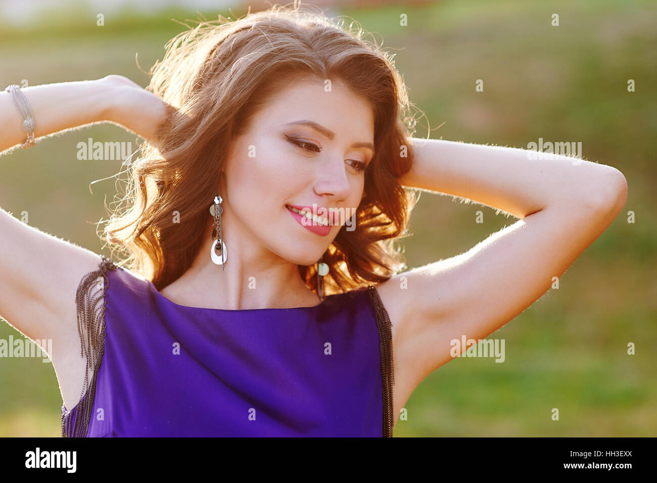 beautiful woman walks in the summer Park Stock Photo - Alamy