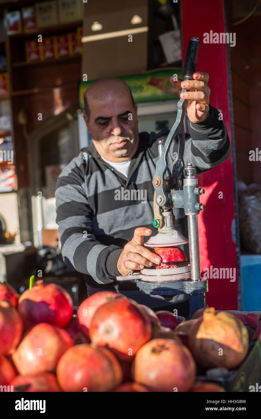 Seller of the fresh pomegranate juice, Jerusalem, Israel Stock Photo