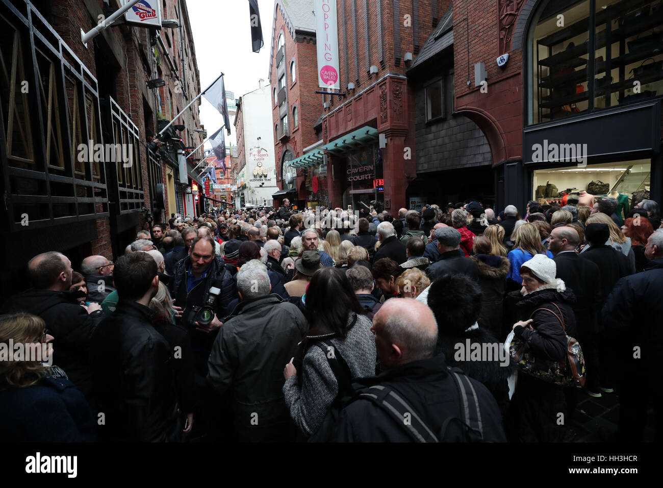 The crowd wait for the unveiling statue of singer Cilla Black outside ...