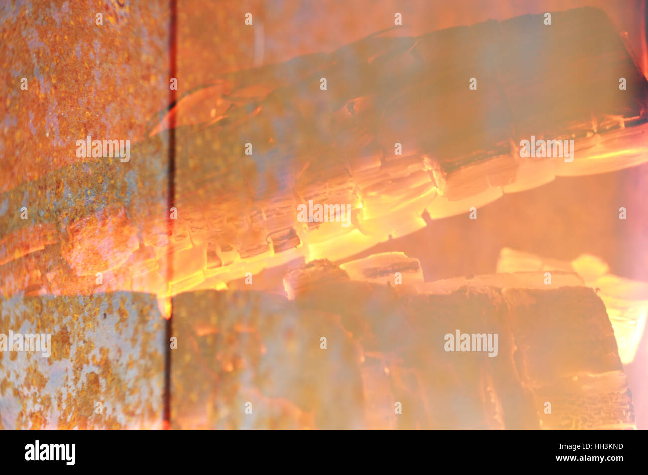 wood-burning fireplace with wood and ember Stock Photo