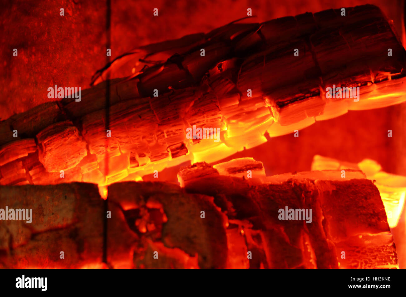 woodburning fireplace with wood and ember Stock Photo Alamy