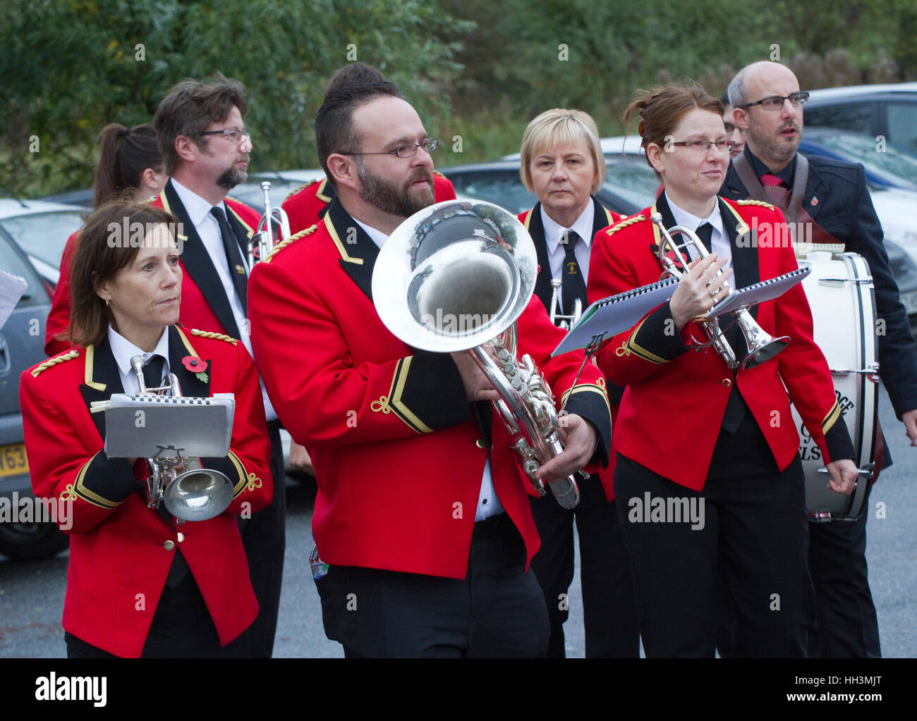 Members of the Woodford Excelsior brass band preparing for a Remembrance Day parade Stock Photo