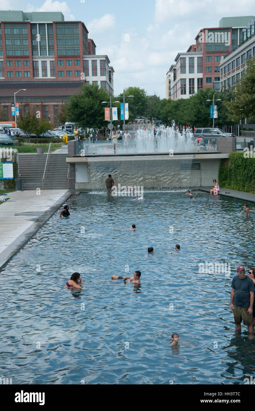 People are splashing in pool at Yards Park, a scenic park with a riverfront boardwalk in the summer in Washington, DC Stock Photo