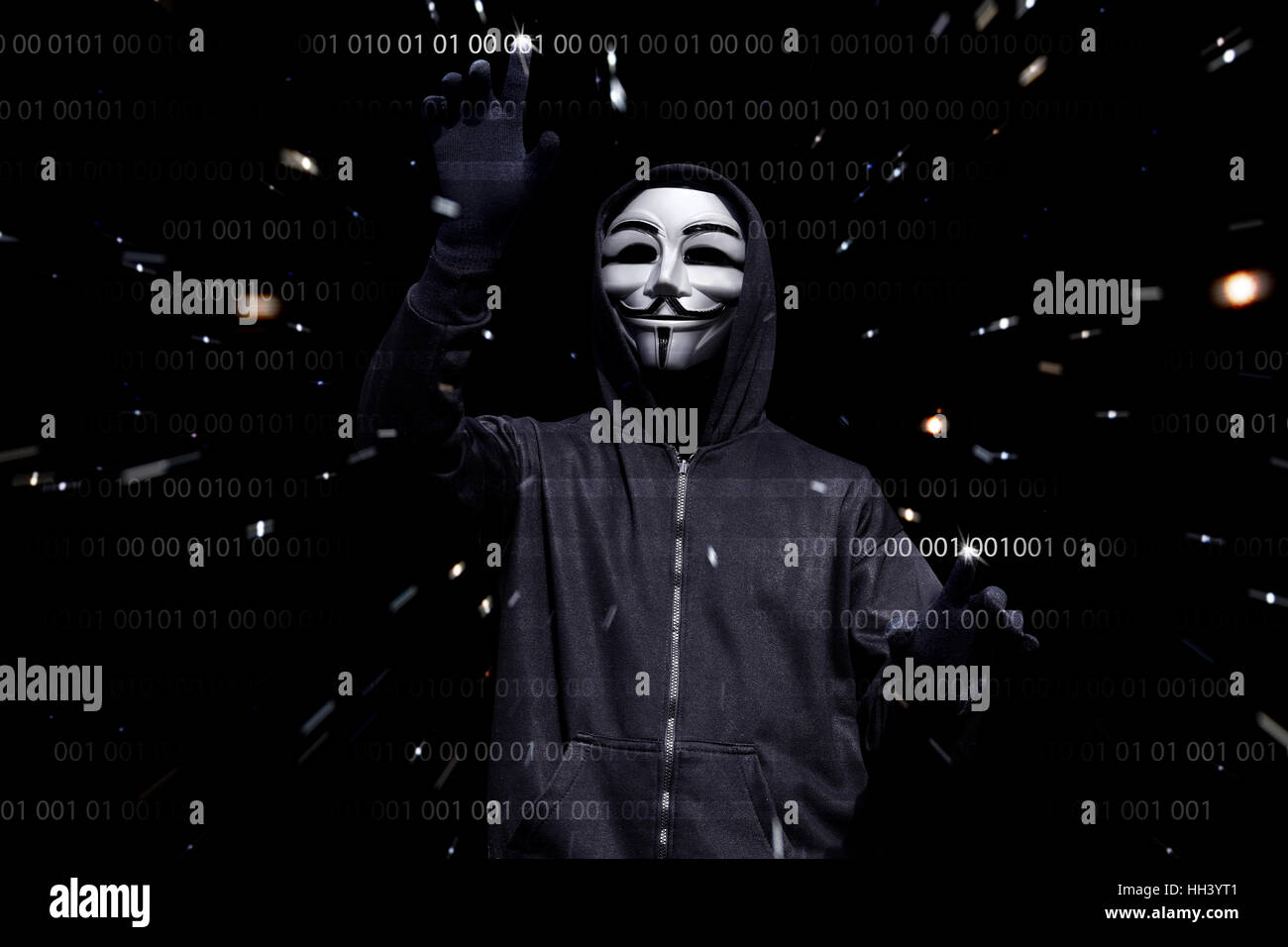 Man anonymous mask hacking binary hi-res stock photography and images ...