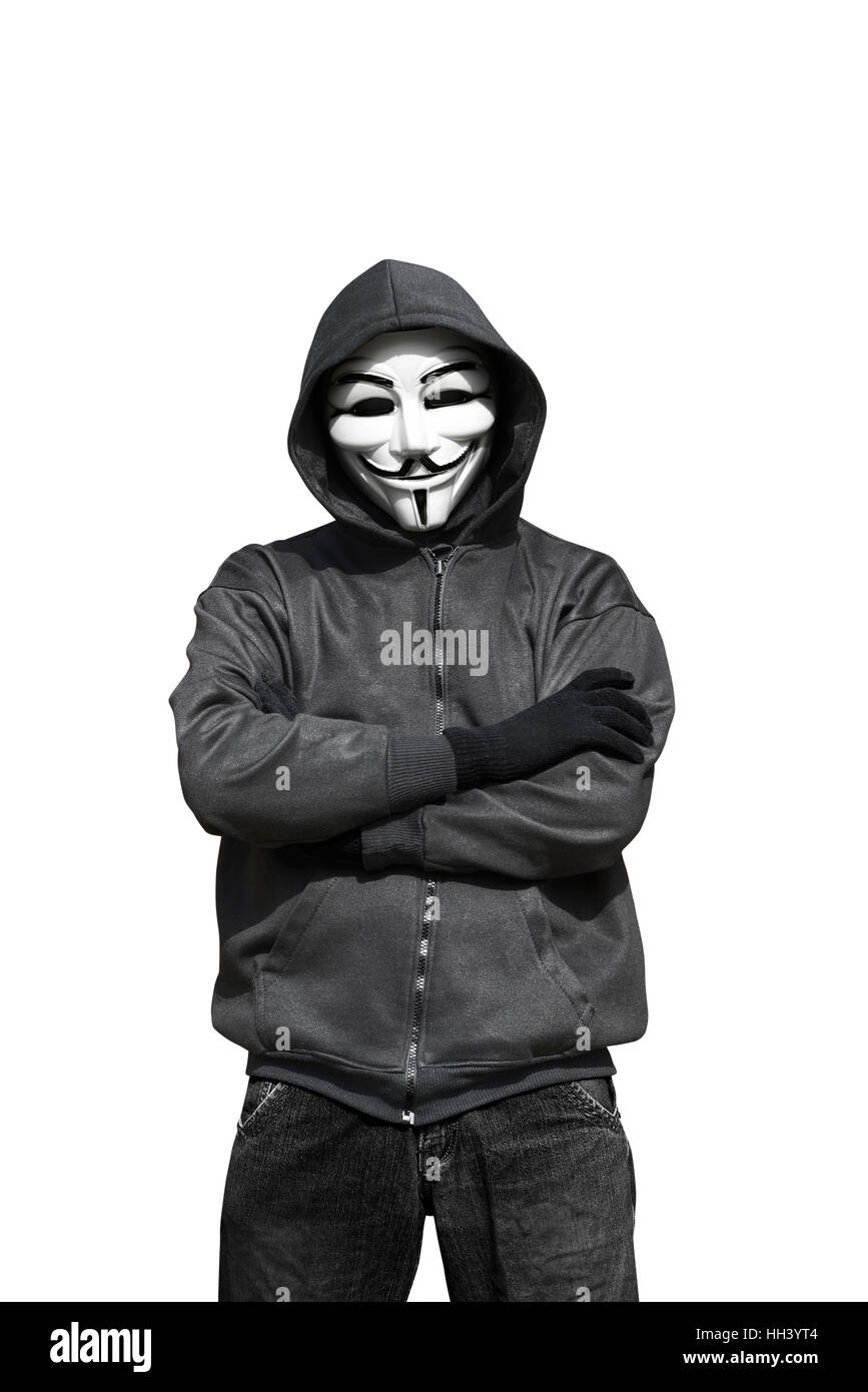 Portrait of man wearing anonymous mask isolated against white background Stock Photo