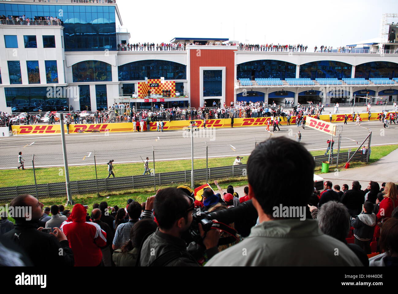 People watching the race from the grandstand at the race track of Istanbul Park Circuit. Stock Photo