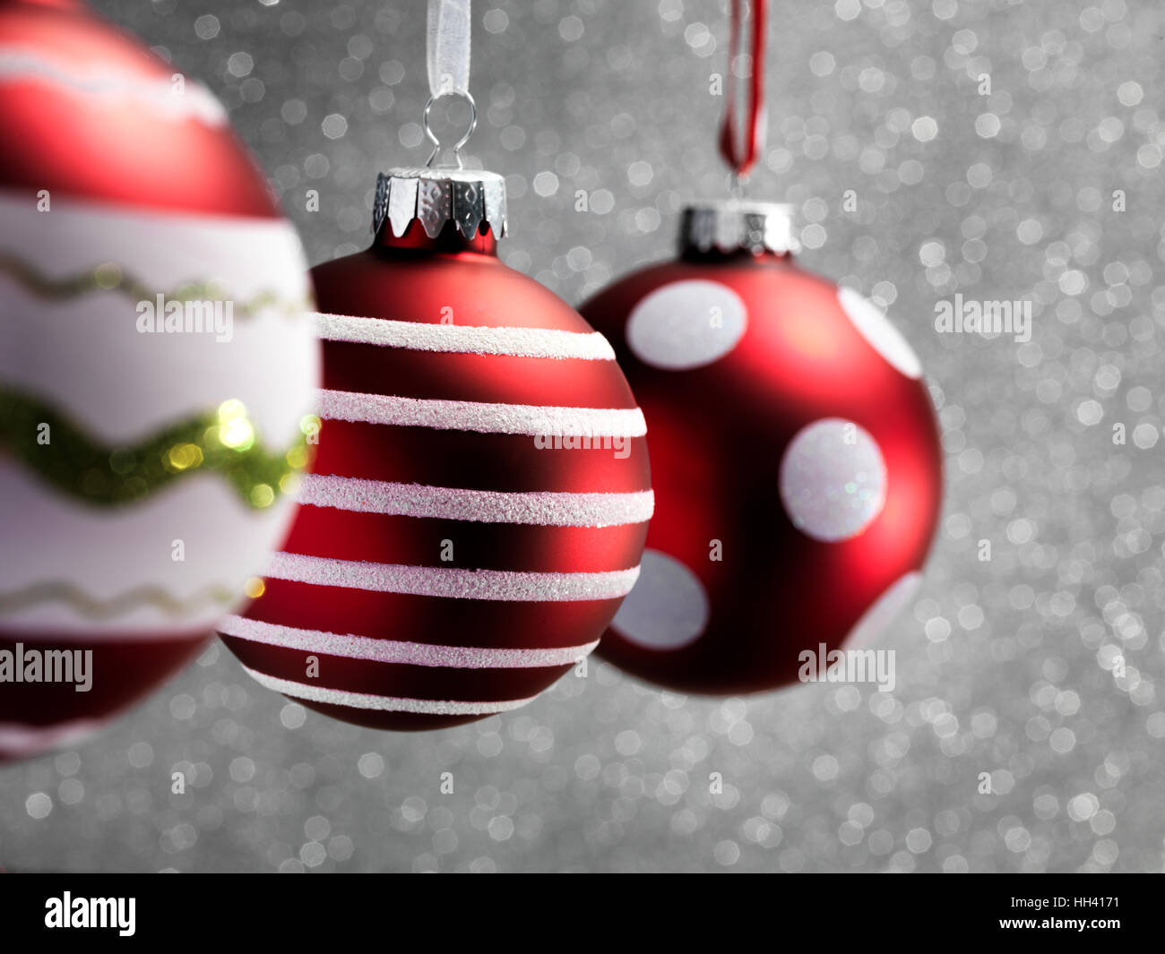 Silver christmas baubles in the snow hi-res stock photography and ...