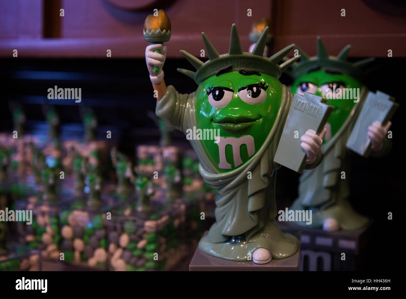 M&M's green character as Statue of Liberty candy dispenser displayed at M&M's world in Times Square, Manhattan, New York City. Stock Photo