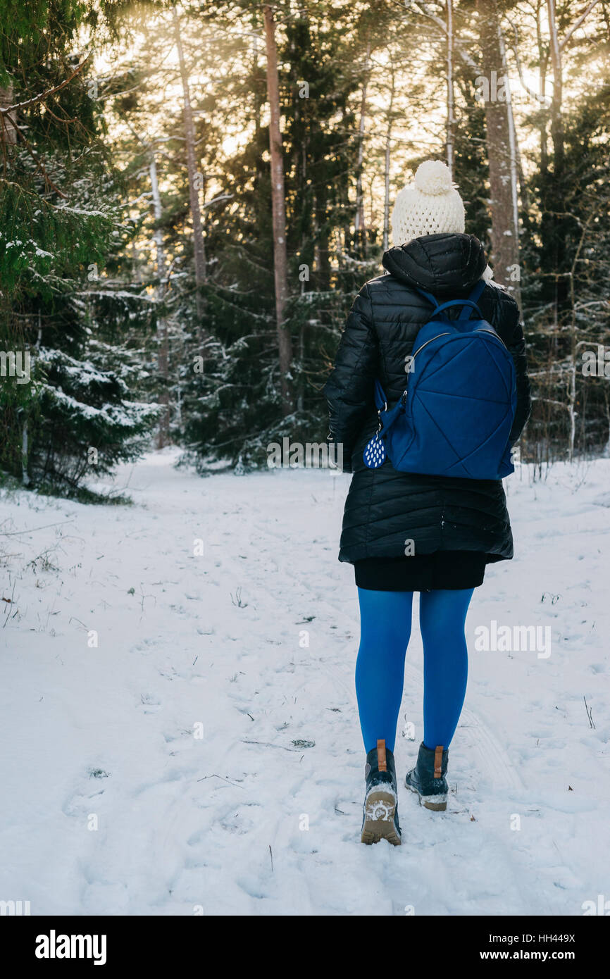 Walking through snowy forest hi-res stock photography and images - Alamy