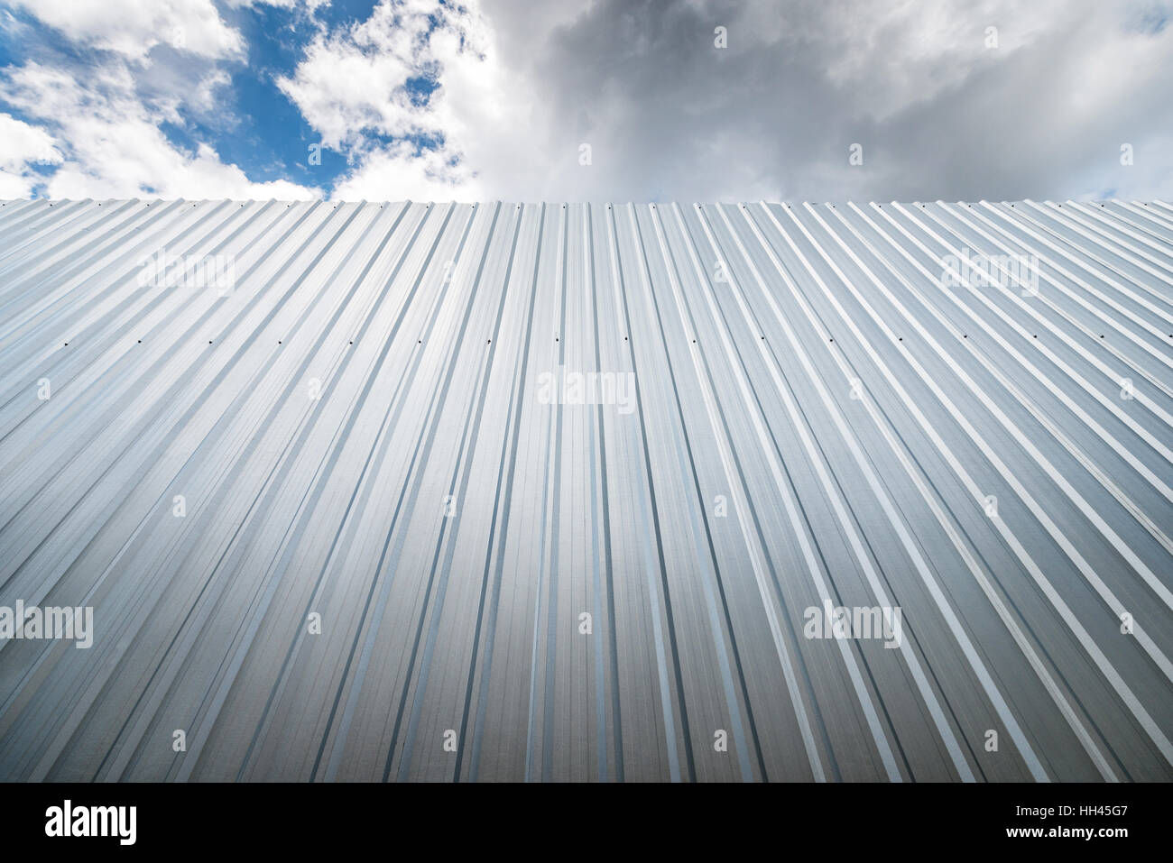 metal sheet wall against blue sky Stock Photo