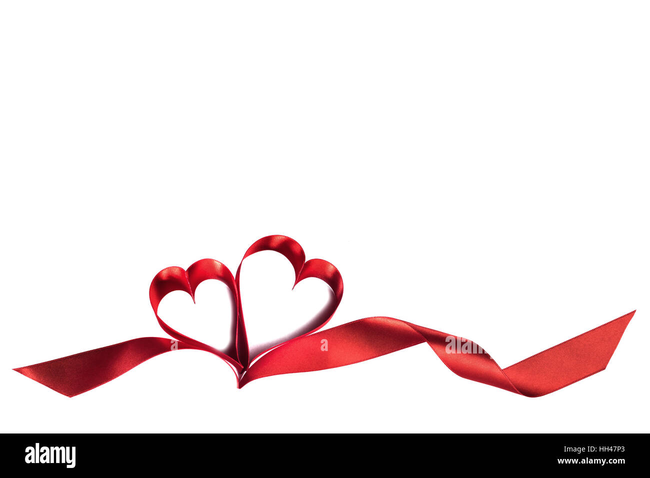Two ribbon hearts isolated on white background Stock Photo - Alamy
