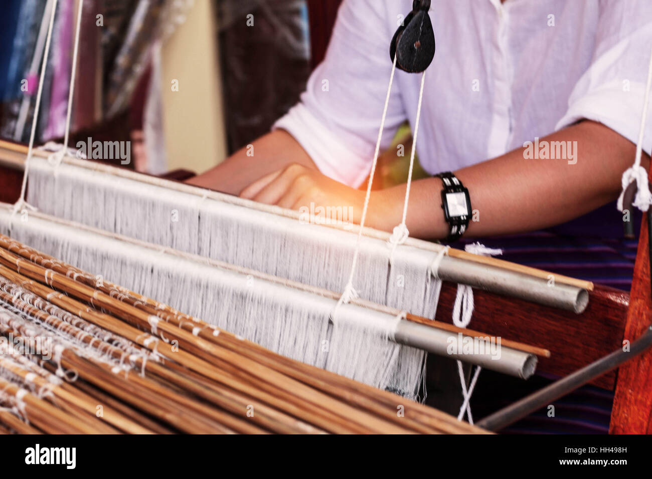 Woman weaving silk in Thailand Stock Photo Alamy