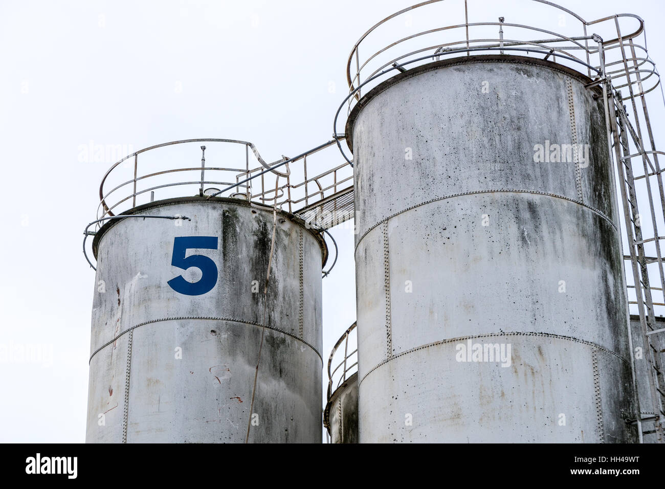 Industrial silos. Tall and with external staircase Stock Photo Alamy