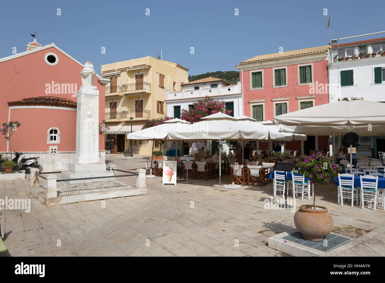 Cafes and restaurants in main square of Gaios town, Paxos, Ionian Islands, Greek Islands, Greece, Europe Stock Photo