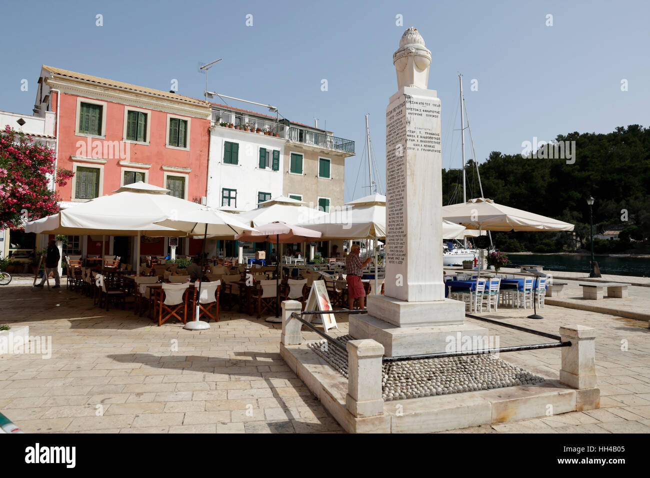 Cafes and restaurants in main square of Gaios town, Paxos, Ionian Islands, Greek Islands, Greece, Europe Stock Photo