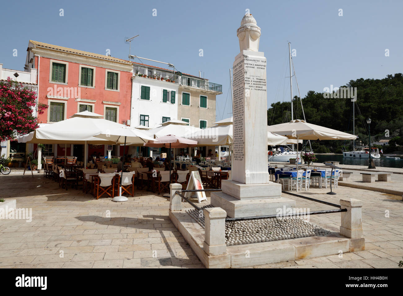 Cafes and restaurants in main square of Gaios town, Paxos, Ionian Islands, Greek Islands, Greece, Europe Stock Photo