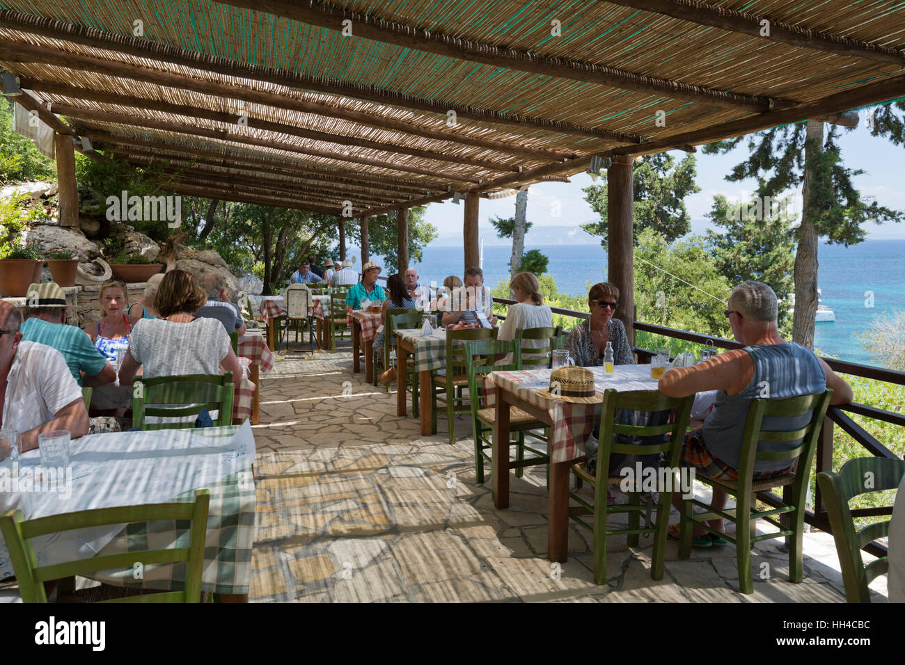 Greek restaurant on Monodendri beach, Paxos, Ionian Islands, Greek Islands, Greece, Europe Stock Photo