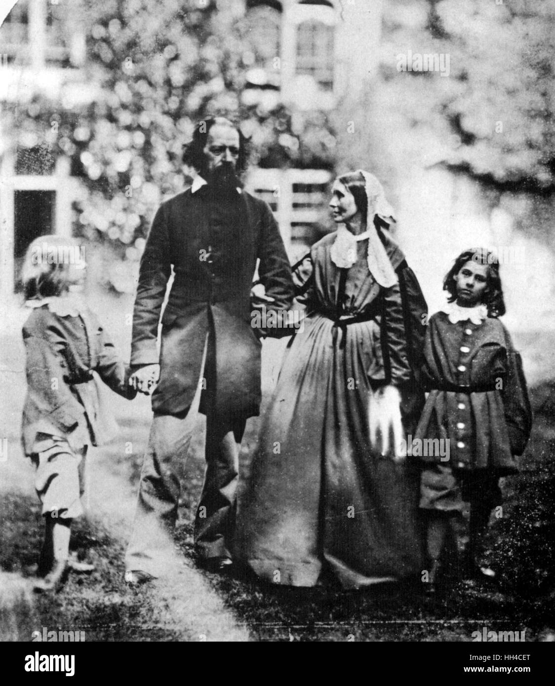 Lord Tennyson with his wife Emily (1813–1896) and his sons Hallam (1852–1928) and Lionel (1854–1886). 1862 Stock Photo
