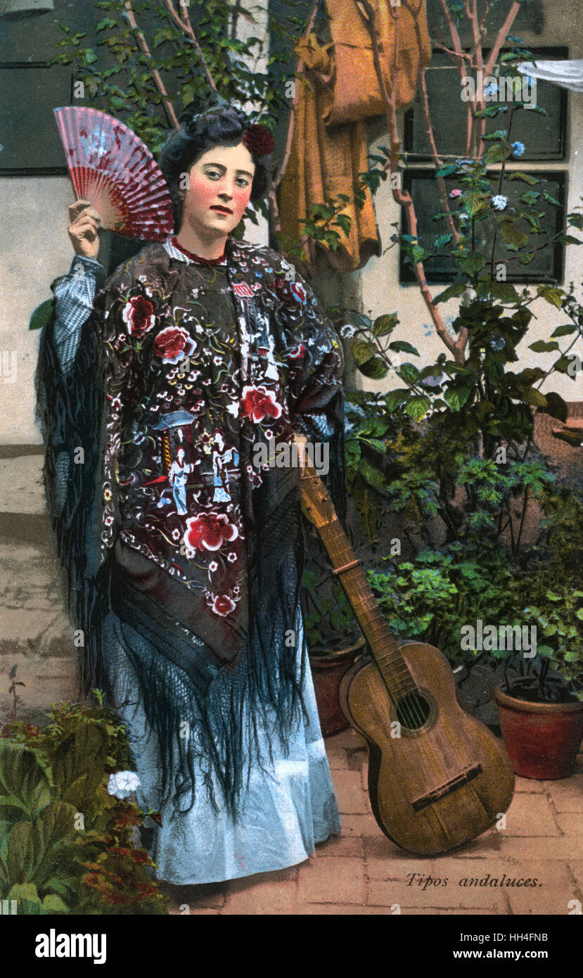 Spain - Andalucian Lady with guitar and fan - Japanese shawl Stock Photo