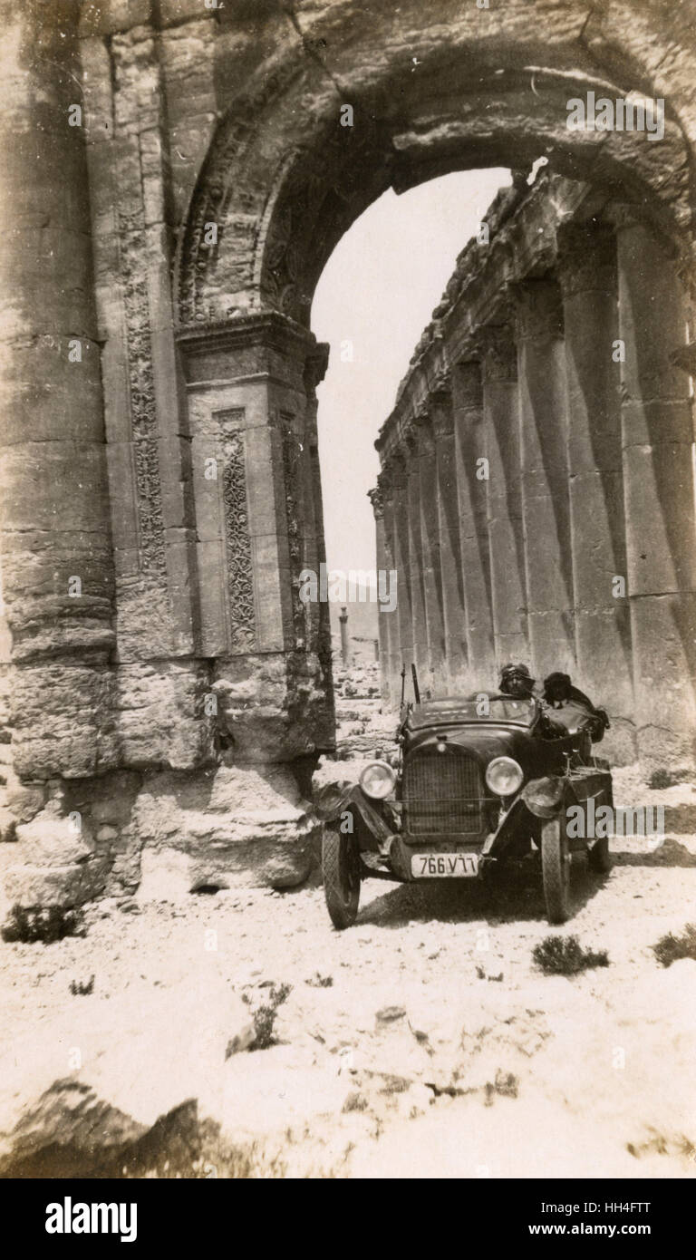European Gentleman driven Triumphal Arch, Palmyra, Syria Stock Photo