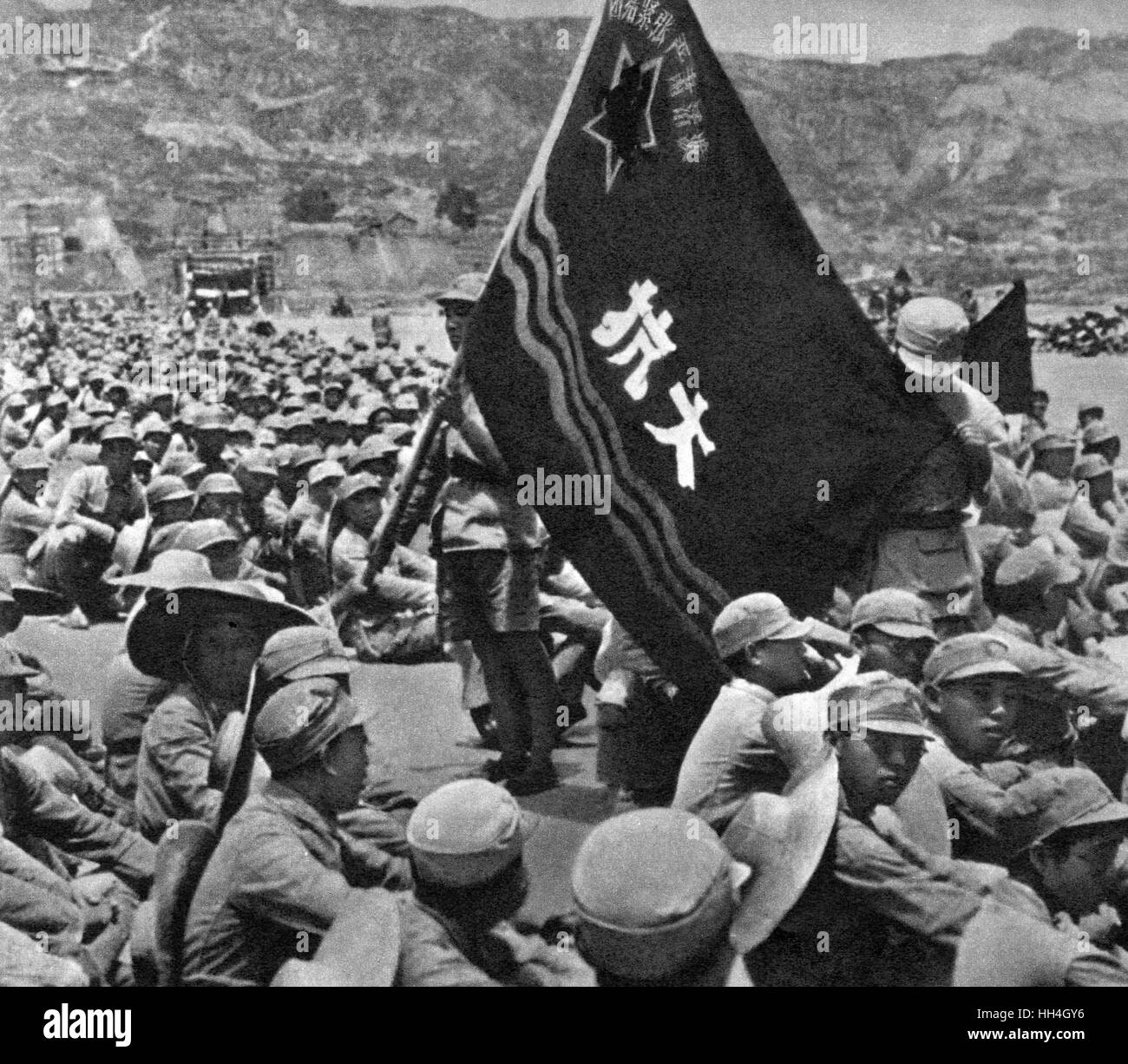 Communist China - soldiers with flag Stock Photo