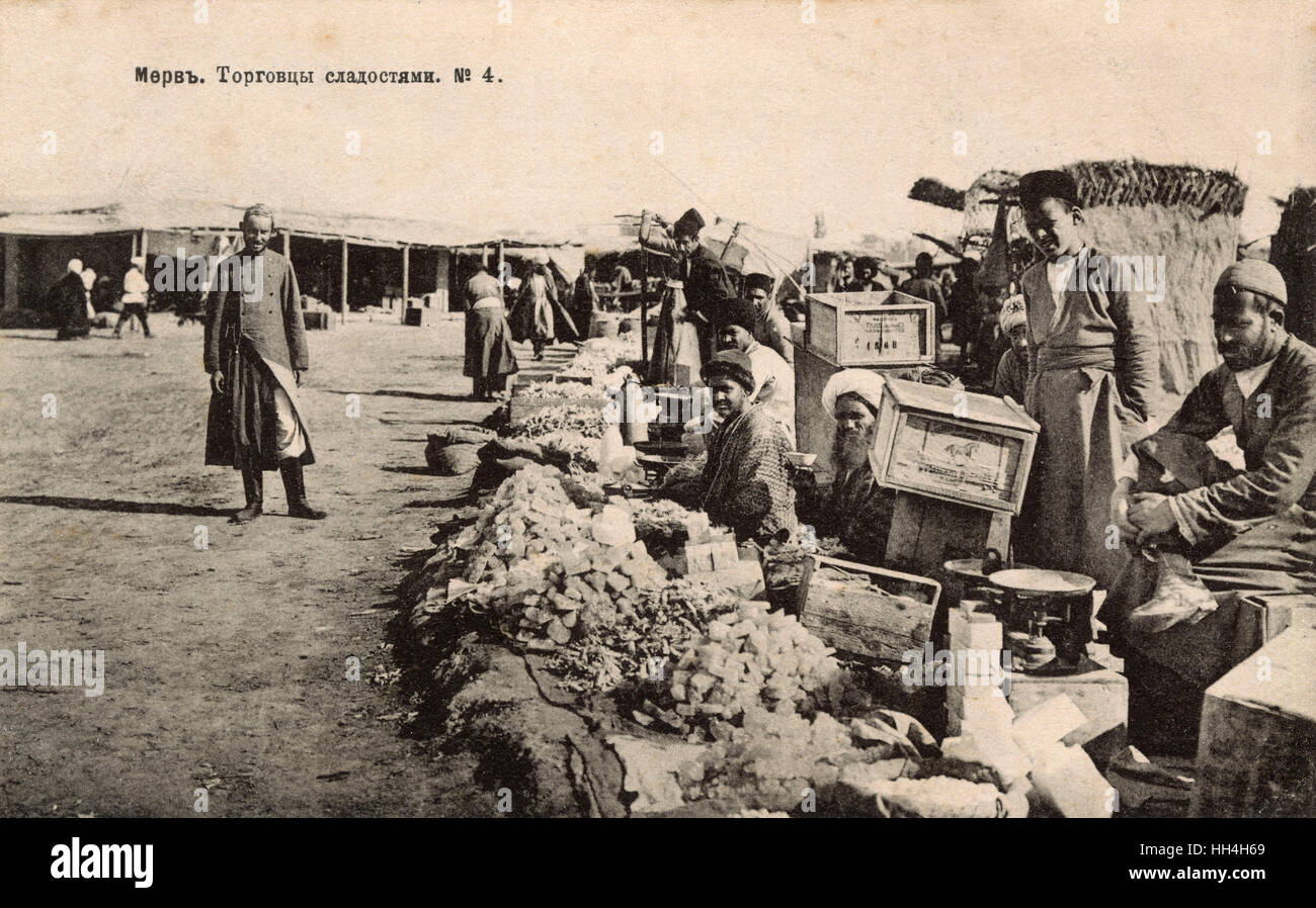 Turkmenistan - Turkomen selling sweets at market andria and Antiochia in Margiana - a major oasis-city in Central Asia, on the historical Silk Road, located near today's Mary in Turkmenistan. Stock Photo